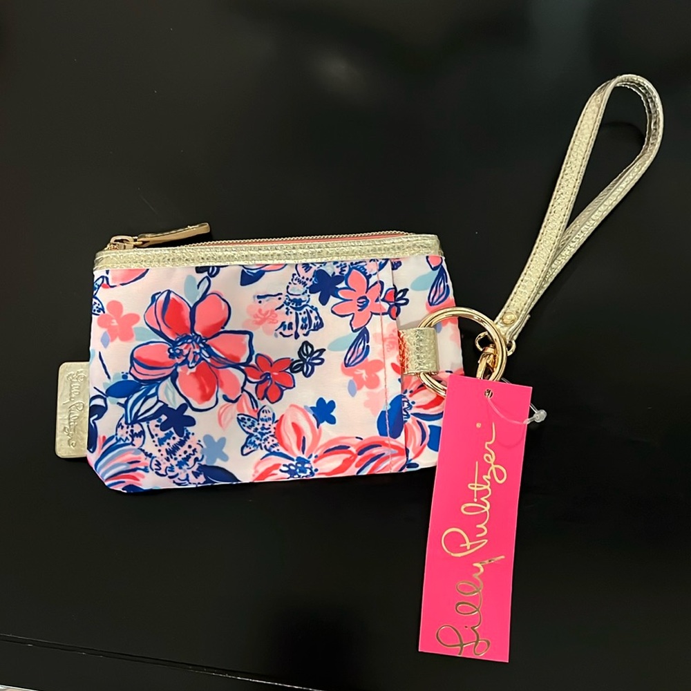 Lilly Pulitzer zip top wallet in “ Party like a Lobster” 6.4 X 4.0. NWT. Pocket
